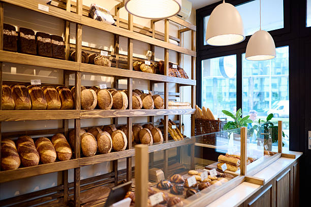 freshly baked bread displayed on wooden shelves
